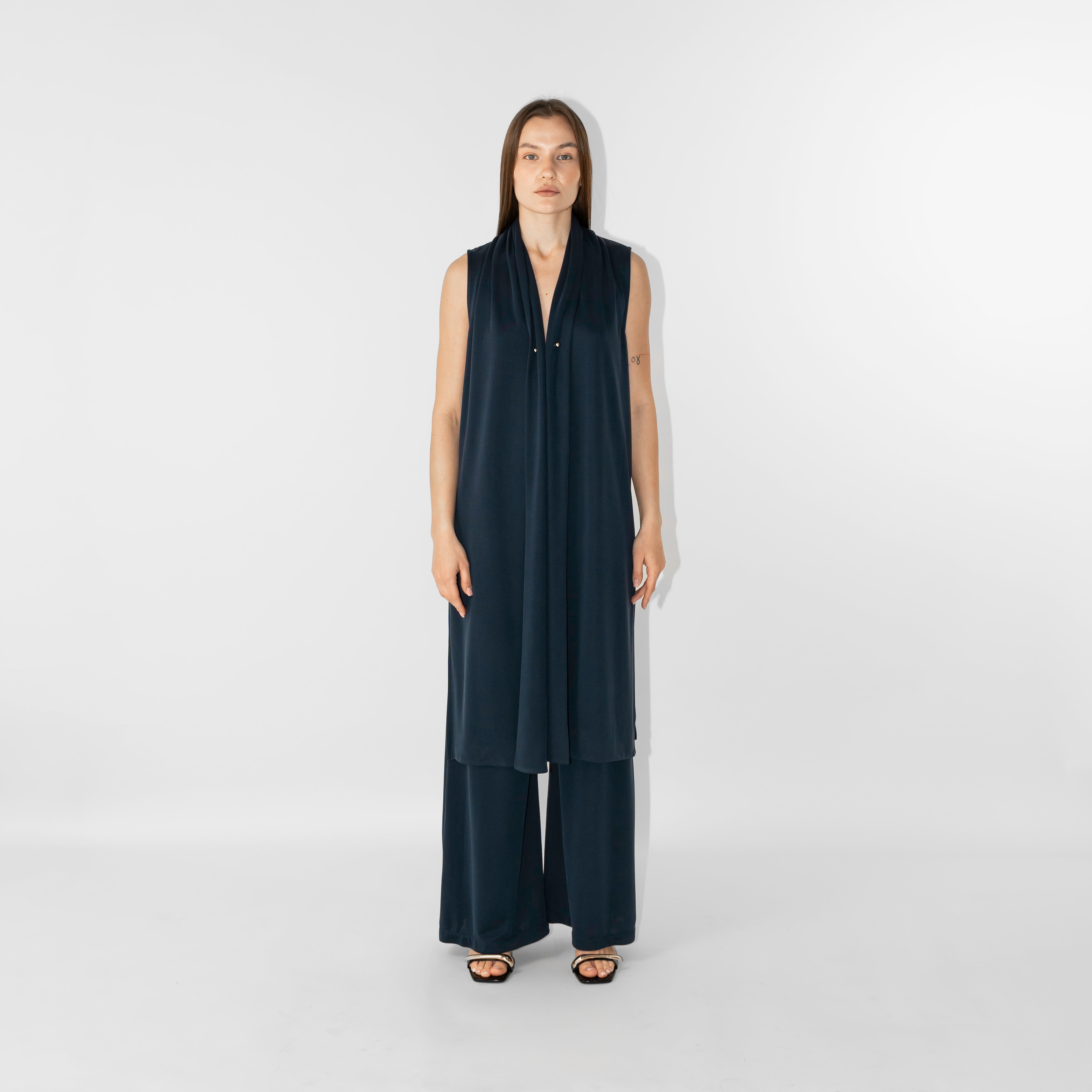 Gilet lungo chiusura con spillo
