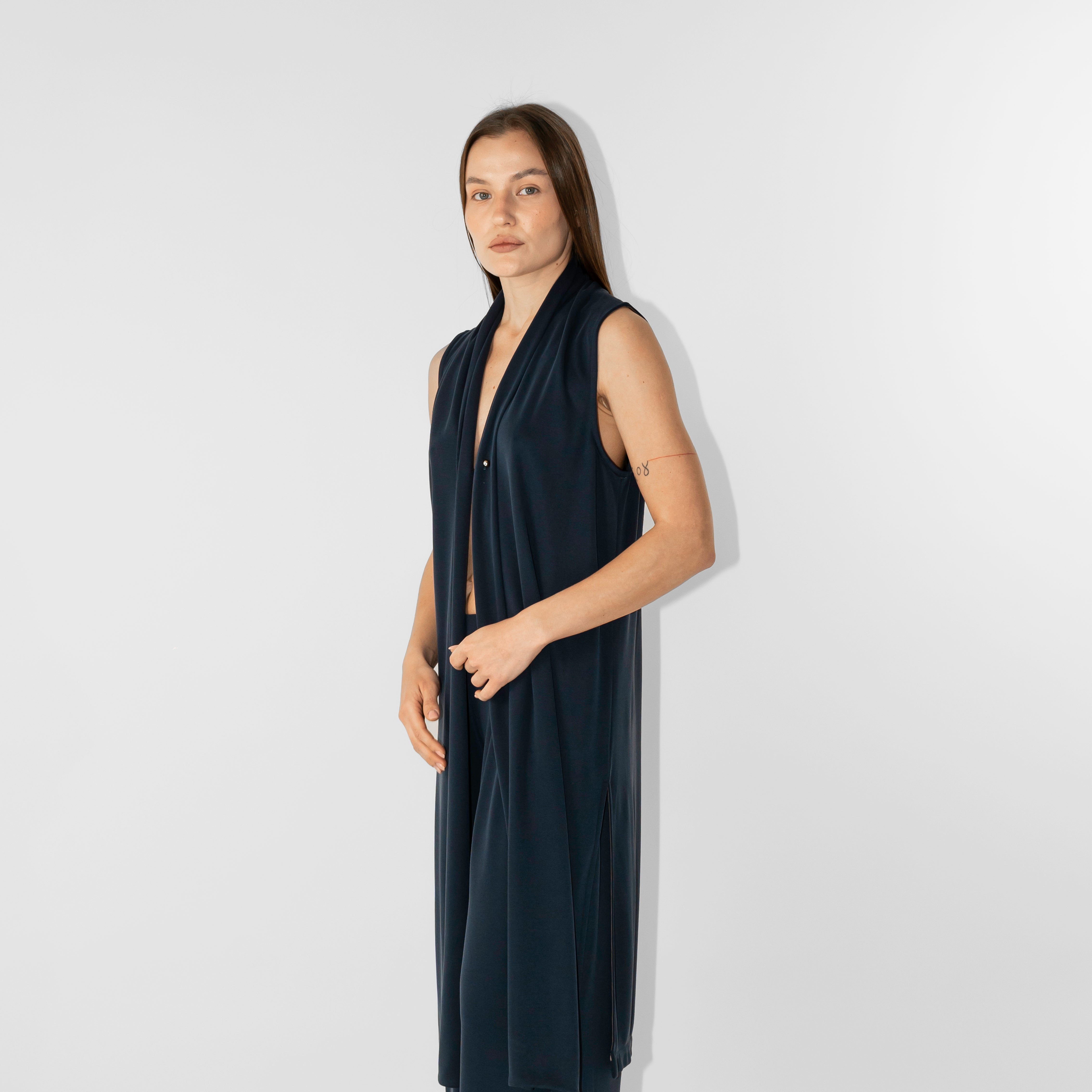 Gilet lungo chiusura con spillo