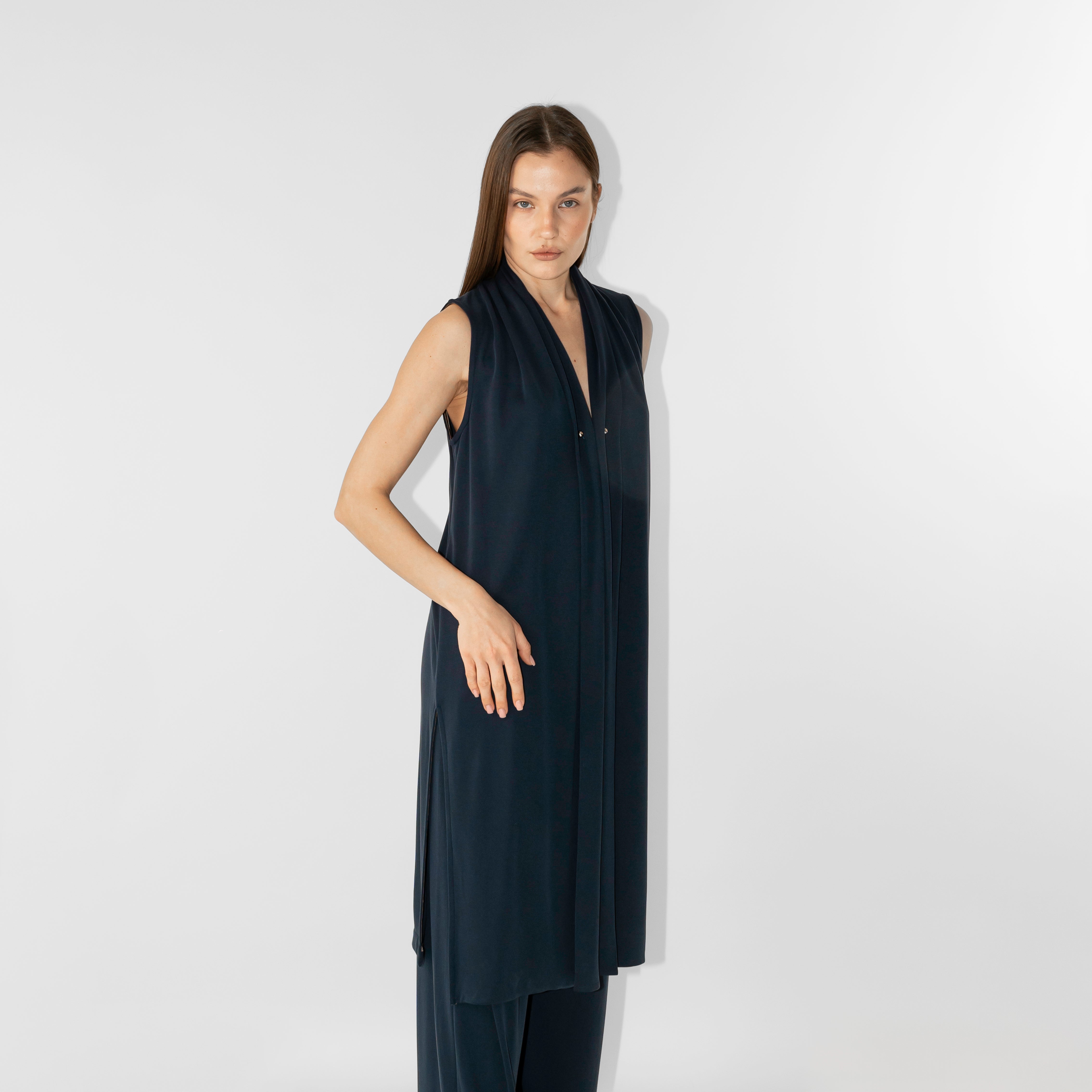 Gilet lungo chiusura con spillo