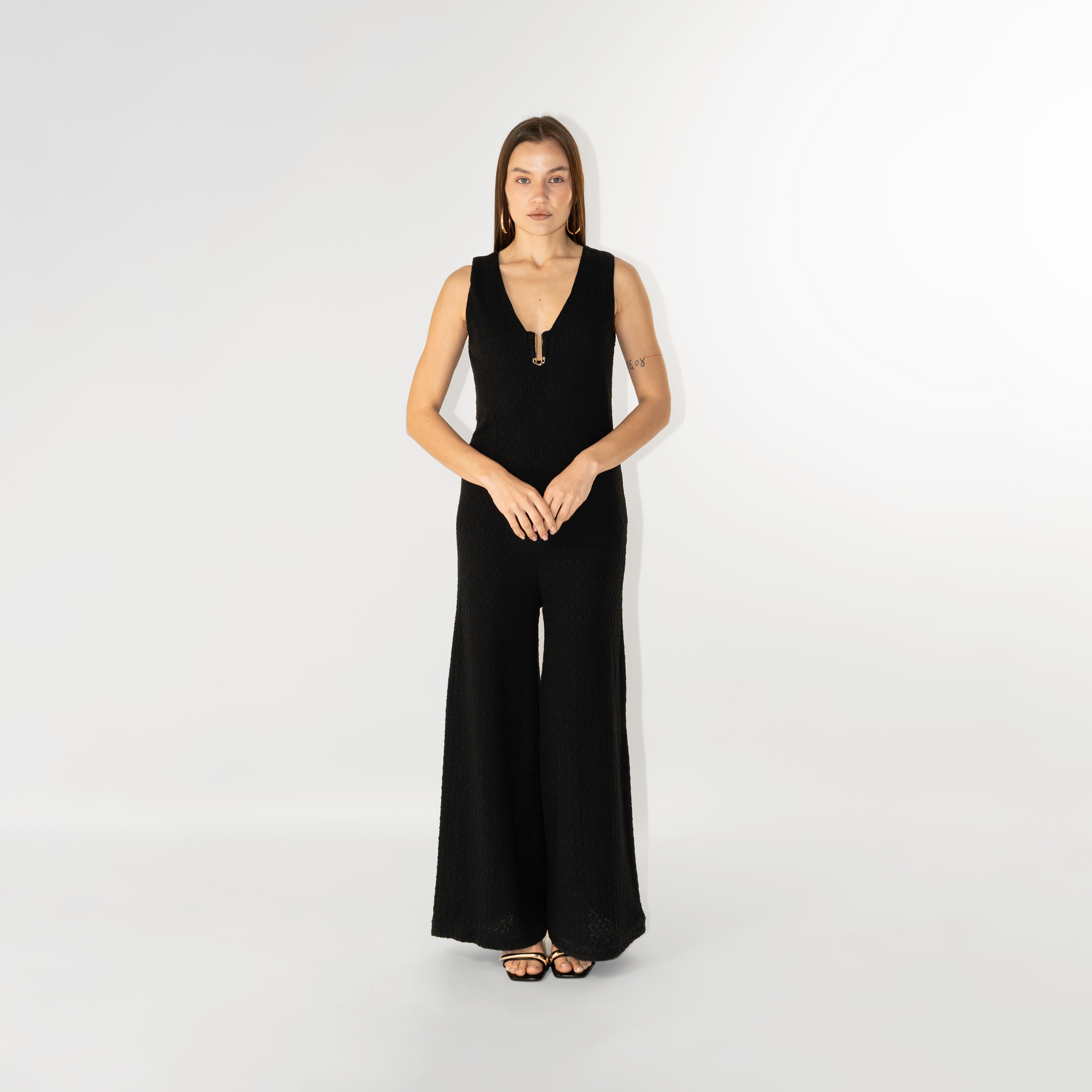 Tuta Jumpsuit smanicata con texture martellata